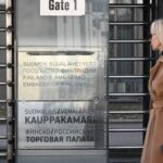 A woman walks past the embassy of Finland in Moscow, Russia. Sputnik