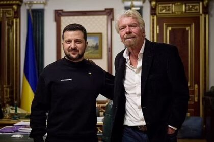 Richard Branson poses for a picture with Ukraine's President Volodymyr Zelenskiy during a meeting, amid Russia's attack on Ukraine, in Kyiv, Ukraine on April 10, 2023