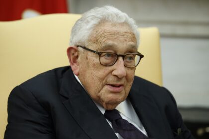 Former Secretary of State Henry Kissinger speaks during a meeting with President Donald Trump at the White House in October 2017. Evan Vucci / AP, file