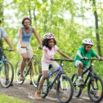A family riding bicycles. Photo: Britannica