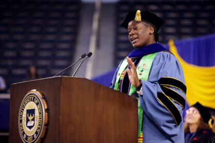Nigerian Oluwami Dosunmu-Ogunjobi speaking at the College of Engineering Graduate Student Commencement at the University of Michigan on May 1, 2024. Image courtesy of Brenda Ahearn.