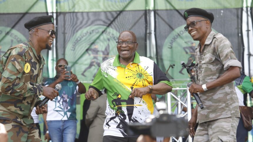 Former president Jacob Zuma dances along with MK Party members during a party rally in KwaXimba on Sunday. Picture: Doctor Ngcobo, Independent Newspapers