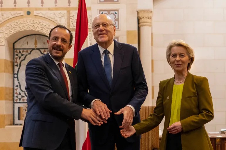 Lebanese caretaker Prime Minister Najib Mikati, centre, Cyprus President Nikos Christodoulides, left, and European Commission President Ursula von der Leyen meet at the government palace in Beirut on May 2, 2024 [Hassan Ammar/AP Photo]