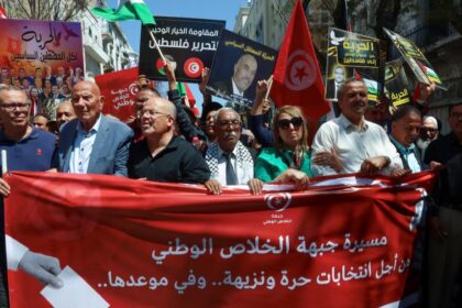 Imed Khemiri, a senior official in the Ennahda party and member of the Salvation Front (L) takes part in a protest, demanding the release of imprisoned journalists, activists, opposition figures and setting a date for fair presidential elections in Tunis, Tunisia May 12, 2024. REUTERS/Jihed Abidellaoui