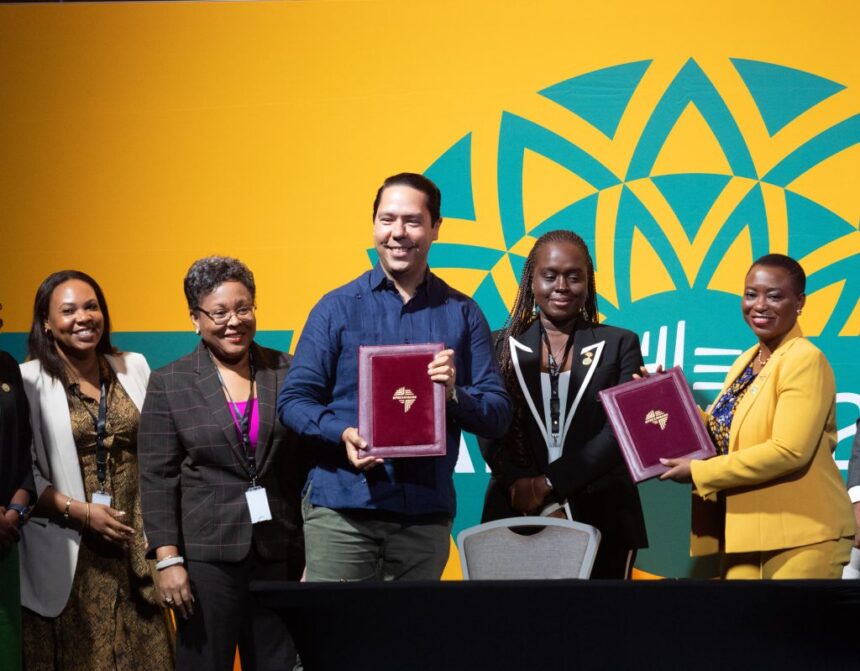 Ms. Oluranti Doherty, Director of Export Development at Afreximbank (right), and Mr. Leo Naut, Deputy Executive Director and Officer-in-Charge at CEDA (third from left), proudly showcase the signed collaboration MoU following the signing ceremony.