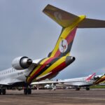 Newly acquired Uganda Airlines Bombardier CRJ900 aircraft stand on the runway at Entebbe Airport NICHOLAS BAMULANZEKI/AFP/AFP/Getty Images