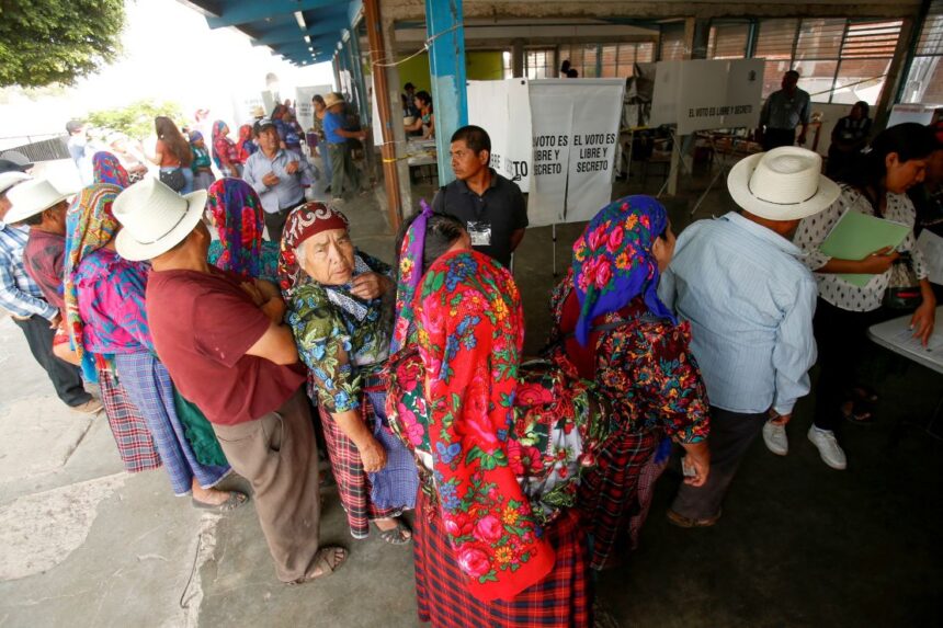 People wait to vote in San Bartolome Quialana, Mexico, on June 2, 2024. Jorge Luis Plata/Reuters