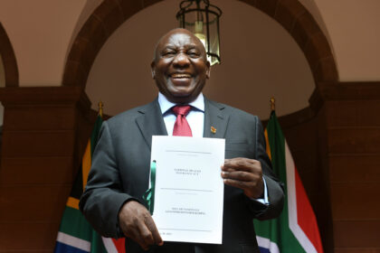 President Cyril Ramaphosa, joined by the Minister of Health, Dr Joe Phaahla, signing into law the National Health Insurance (NHI) Bill which directs the transformation of the South Africa’s health care system to achieve universal coverage for health services and, through this, overcome critical socio-economic imbalances and inequities of the past.[Photo: GCIS]