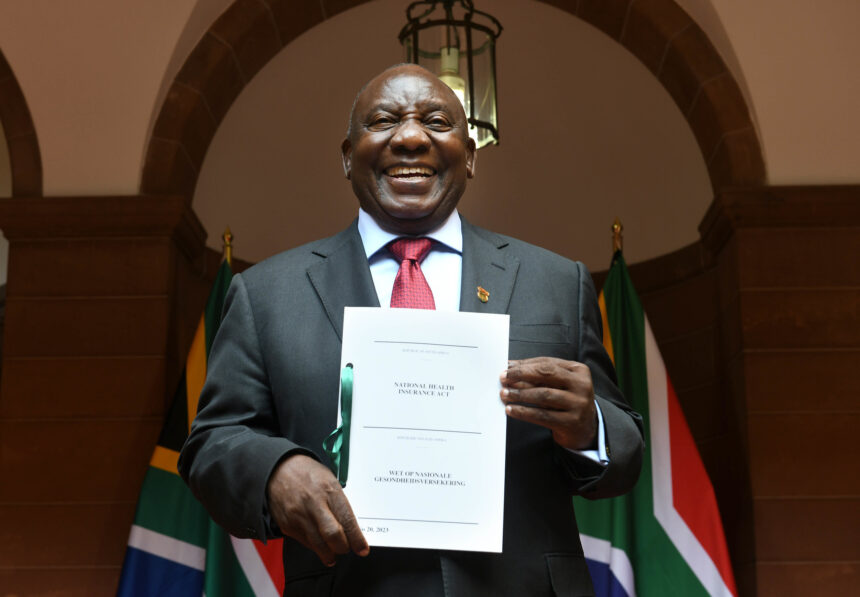 President Cyril Ramaphosa, joined by the Minister of Health, Dr Joe Phaahla, signing into law the National Health Insurance (NHI) Bill which directs the transformation of the South Africa’s health care system to achieve universal coverage for health services and, through this, overcome critical socio-economic imbalances and inequities of the past.[Photo: GCIS]