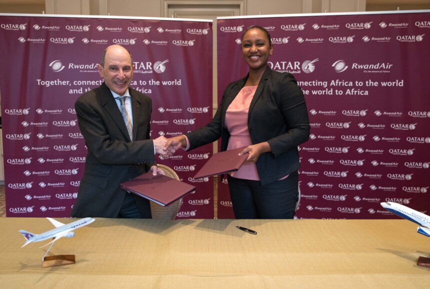 The Qatar Airways Group Chief Executive Akbar Al-Baker and RwandAir CEO Yvonne Makolo signed the deal.