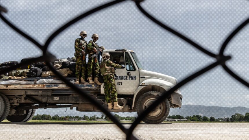 A truck carries the luggage of Kenyan police officers as they arrive in Port-au-Prince, Haiti, at the start of their deployment.
