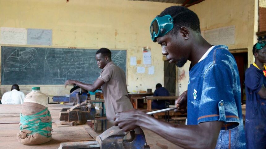 Young men practising plumbing in Don Bosco vocational training centre. PHOTO | POOL