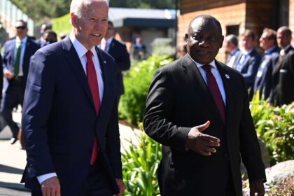 President Joe Biden talks with South Africa's President Cyril Ramaphosa as they arrive for a working session during the G7 summit in Carbis Bay, Cornwall, Britain, on June 12, 2021. REUTERS/Leon Neal