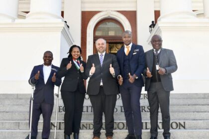 South Africa's Home Affairs Minister Leon Schreiber and DG Makhode with service delivery champions, Fuzile Sibetha (L), Dudu Mahlangu (VFS) and Mthetheleli Draai. Photo: X/@HomeAffairsSA