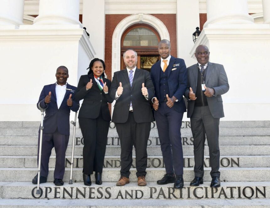 South Africa's Home Affairs Minister Leon Schreiber and DG Makhode with service delivery champions, Fuzile Sibetha (L), Dudu Mahlangu (VFS) and Mthetheleli Draai. Photo: X/@HomeAffairsSA