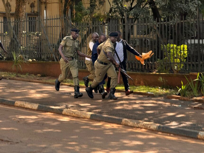 Ugandan Police arrests a protester in the streets of Kampala, Uganda on Tuesday 23 July 2024.