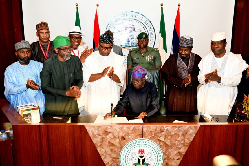 President of the Federal Republic of Nigeria, Bola Tinubu, flanked by members of the Federal Executive Council, signed the new minimum wage bill into law in Abuja on July 29, 2024