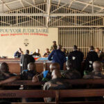 Members of the Congolese army sentenced to death for desertion and cowardice when fighting M23 rebels sit inside a military courtroom during their trial in Goma, North Kivu province, Democratic Republic of Congo, May 3, 2024. REUTERS/Arlette Bashizi/