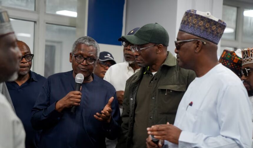 Founder and Chief Executive of the Dangote Group Aliko Dangote addresses workers and members of Nigeria's House of Representatives at the Dangote Petroleum Refinery control room in Lagos, Nigeria, July 20, 2024. REUTERS/Marvellous Durowaiye
