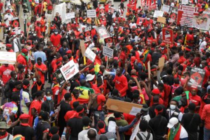 Protesters march on the streets of Accra during a #fixthecountry protest in Accra, Ghana, on August 4, 2021 [File: Nipah Dennis/AFP]