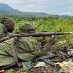 Armed Forces of the Democratic Republic of Congo (FARDC) soldiers take their positions following renewed fighting near the Congolese border with Rwanda, outside Goma in the North Kivu province of the Democratic Republic of Congo, May 28, 2022. REUTERS/Djaffar Sabiti