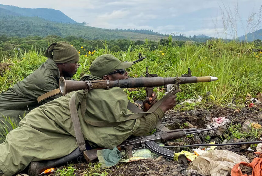 Armed Forces of the Democratic Republic of Congo (FARDC) soldiers take their positions following renewed fighting near the Congolese border with Rwanda, outside Goma in the North Kivu province of the Democratic Republic of Congo, May 28, 2022. REUTERS/Djaffar Sabiti