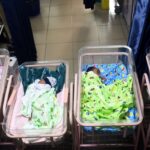 Newborn babies sleep in cots at a maternity center in Lagos, Nigeria, on Oct. 14, 2022.