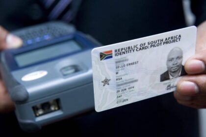 Home Affairs chief information officer demonstrating an ID card reader. Picture: Gallo Images/Foto24/Brendan Croft