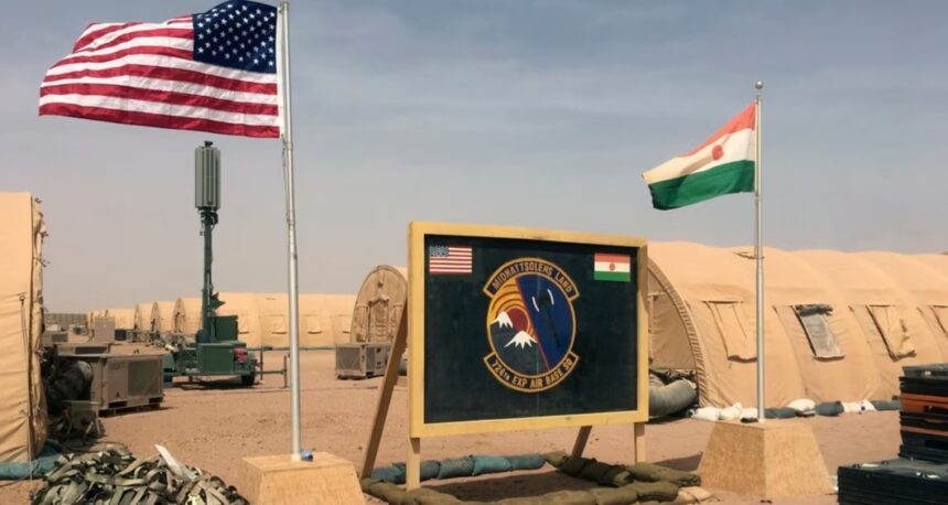U.S. and Nigerien flags are raised at Air Base 201 in Agadez, Niger, April 16, 2018. Air Base 201 is one of two bases U.S. troops have used while stationed in Niger.