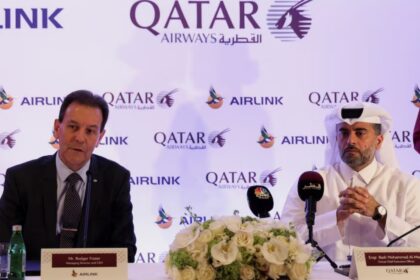Qatar Airways Chief Executive Officer, Badr Mohammed Al Meer and Airlink's CEO Rodger Foster, speak to the media during a signing ceremony, in Doha, Qatar, August 20, 2024. REUTERS/Ibraheem Abu Mustafa