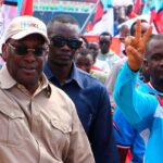 Chairman of Chadema Freeman Mbowe (L) flashes a victory sign during party's first political rally after an imposed ban in 2016 was lifted at Furahisha Grounds in Mwanza, Tanzania on January 21, 2023. PHOTO | FILE | AFP