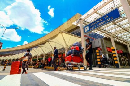 Passengers exit with their luggage at the International Arrival Terminal 1A at Jomo Kenyatta International Airport on November 7, 2023.