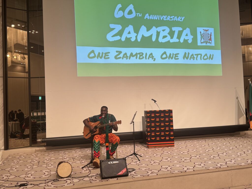 Zambian Ambassador Dr. Tobias Mulimbika with guests at the 60th Independence anniversary celebration in Tokyo. Photo: Zambia Embassy in Tokyo, Japan.