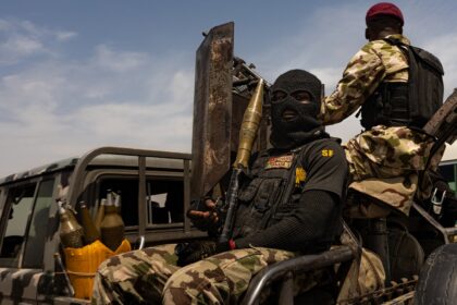 A Nigerian special forces soldier holds an RPG-7 while on patrol with the 7th Division in Borno State.
