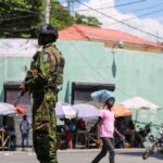 A Kenyan police officer patrols as the country is facing emergency food insecurity while immersed in a social and political crisis, in Port-au-Prince, Haiti October 3, 2024. REUTERS/Jean Feguens Regala/File Photo