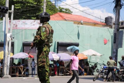 A Kenyan police officer patrols as the country is facing emergency food insecurity while immersed in a social and political crisis, in Port-au-Prince, Haiti October 3, 2024. REUTERS/Jean Feguens Regala/File Photo