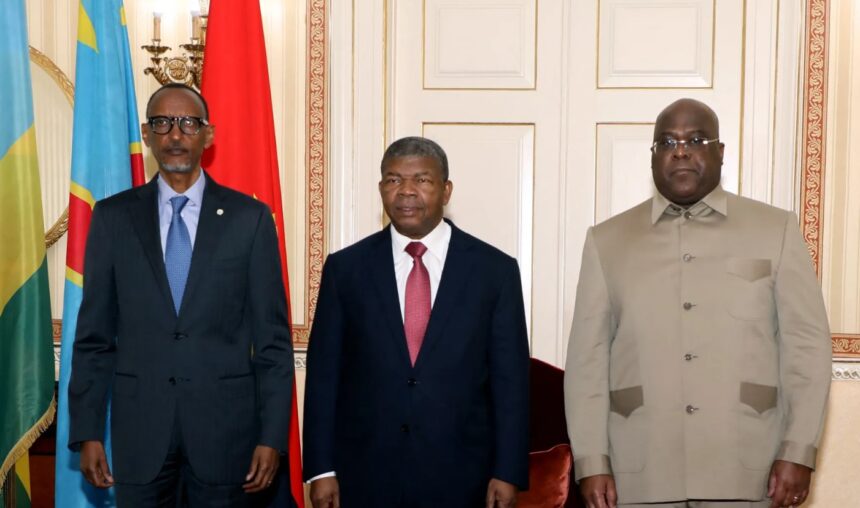 Rwanda President Paul Kagame,left , Angola President Joao Lourenco, centre, and DR Congo President Felix Tshisekedi, right, pose for a photograph in Luanda [Jorge Nsimba/AFP]