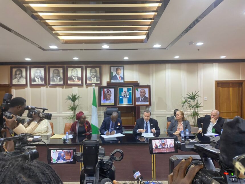 Attorney-General Lateef Fagbemi signs asset recovery agreement in Abuja.