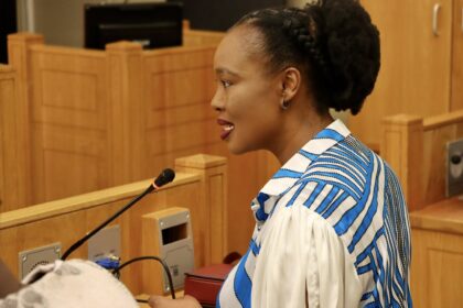 Minister Ndabeni addresses Parliament on Spaza shop registration efforts.