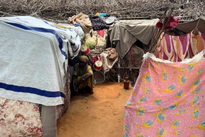 A displaced Sudanese woman rests inside a shelter at Zamzam camp, in North Darfur, Sudan, August 1, 2024. REUTERS/Mohamed Jamal Jebrel/File Photo