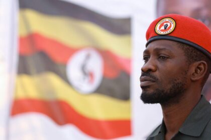 Ugandan opposition leader and singer Robert Kyagulanyi Ssentamu, known as Bobi Wine looks on after his arrival to address Ugandans living in South Africa on political issues in their home country, at the sports ground in Germiston, southeast of Johannesburg, South Africa, October 3, 2023. REUTERS/Siphiwe Sibeko/File Phot