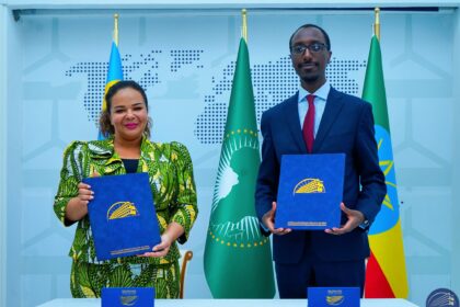 Foreign Ministers Gedion Timothewos of Ethiopia and Thérèse Kayikwamba Wagner of the DRC shake hands after signing a General Cooperation Agreement to strengthen bilateral ties in Addis Ababa.