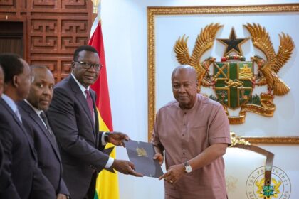 Kenya's Transport Cabinet Secretary Hon. Davis Chirchir presents a message from President Ruto to Ghana’s former President John Mahama during a visit to Accra on May 7, 2025, alongside senior officials. Photo: MoFA Kenya