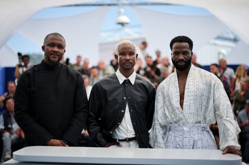 Director Akinola Davies Jr. and cast members Sope Dirisu and Wale Davies poses during a photocall for the film "My Father's Shadow" in competition for the category Un Certain Regard at the 78th Cannes Film Festival in Cannes, France, May 18, 2025. REUTERS/Sarah Meyssonnier