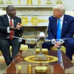 President Donald Trump meets South African President Cyril Ramaphosa in the Oval Office of the White House on Washington, DC, on May 21. Evan Vucci/AP