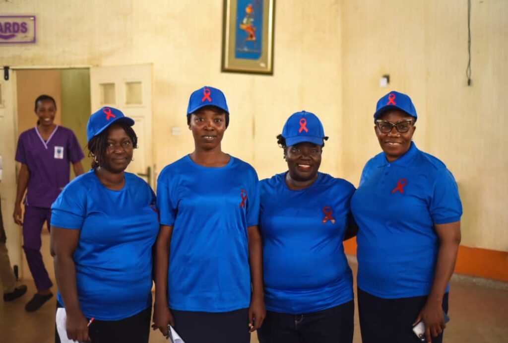 Young advocates and healthcare professionals engage participants during the HIV awareness program at the University of Medical Sciences Teaching Hospital, Ondo.