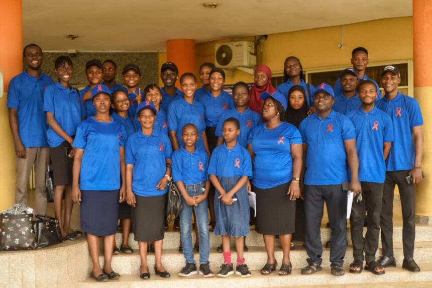 Young advocates and healthcare professionals engage participants during the HIV awareness program at the University of Medical Sciences Teaching Hospital, Ondo.
