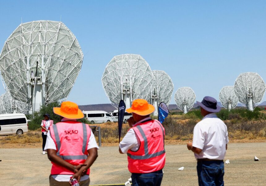 People look at Meerkat telescope array at the launch of the construction of Square Kilometre Array-Mid telescope outside the town of Carnarvon, with a similar ceremony taking place in SKA co-host Australia on the same day, in Northern Cape, South Africa, December 05, 2022. REUTERS/Esa Alexander/File Photo